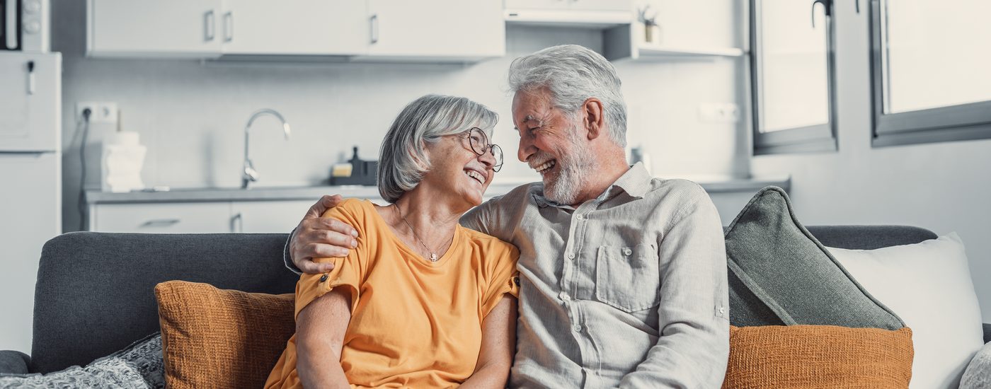 A couple together in their kitchen